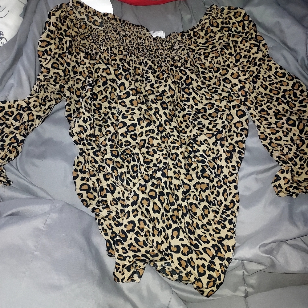 Leopard print top. Size Large.